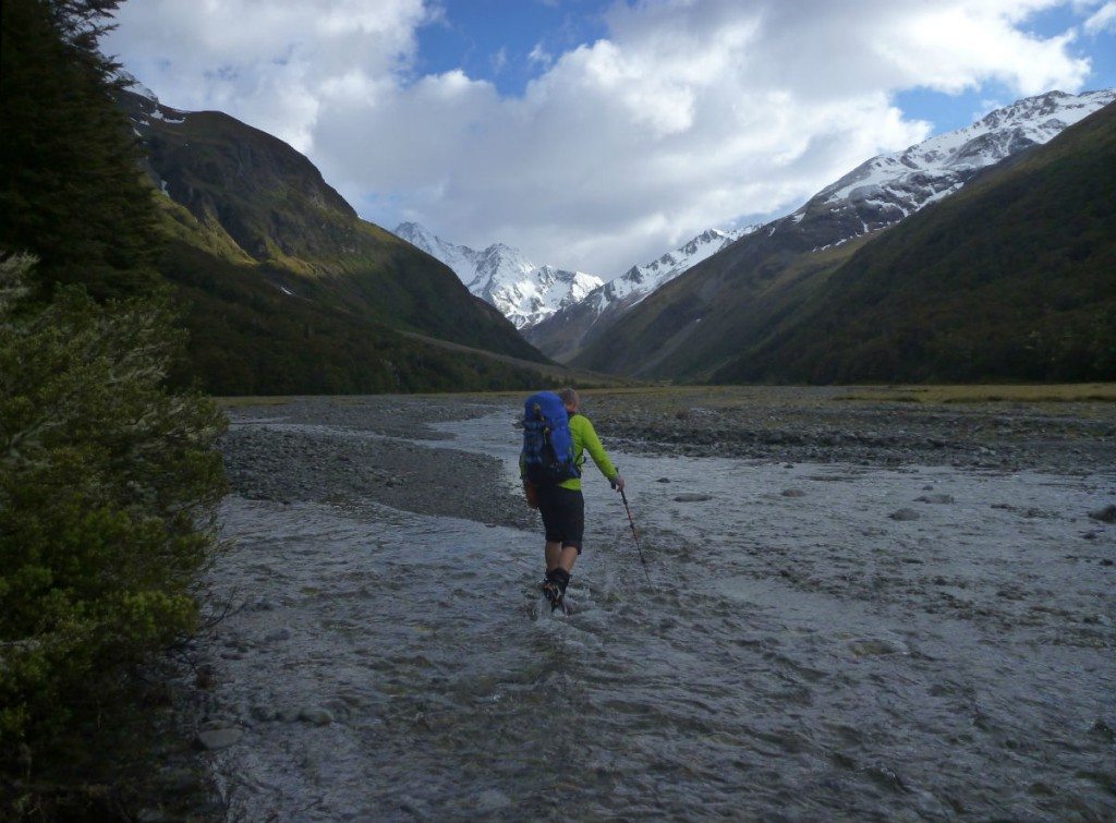 Heading up the Ahuriri with the low and high peaks of Mt Huxley on the skyline. Photo: Paul Hersey