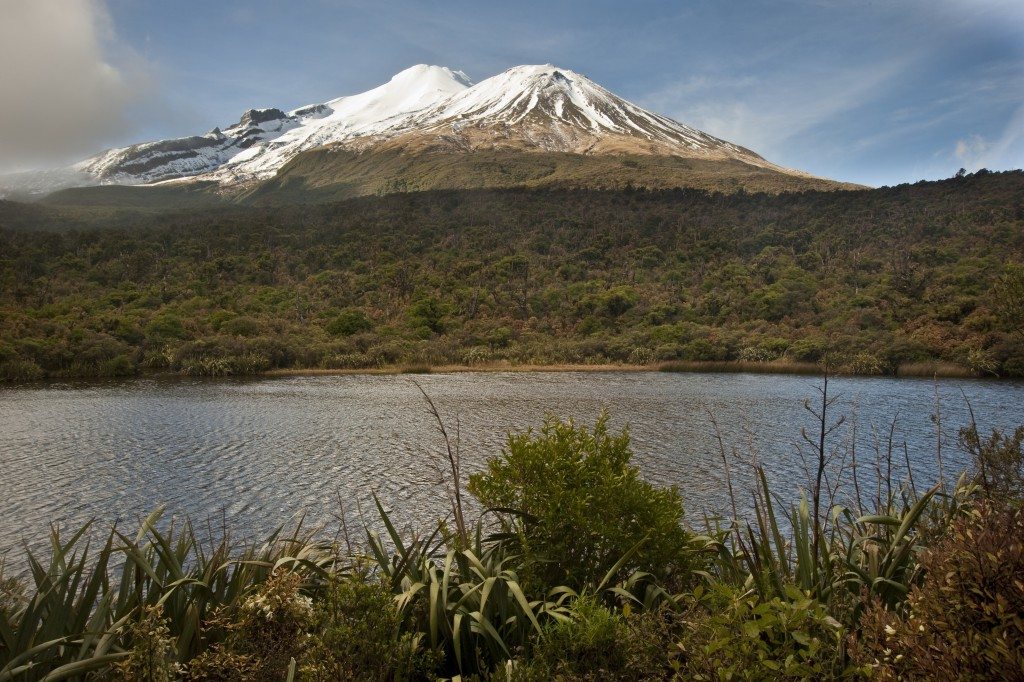 Mt Taranaki and Fanthams Peak from Lake Dive. Photo: Shaun Barnett/Black Robin Photography